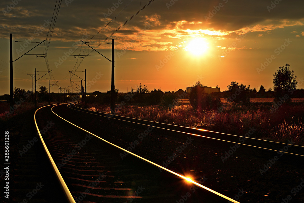 railroad tracks at sunset