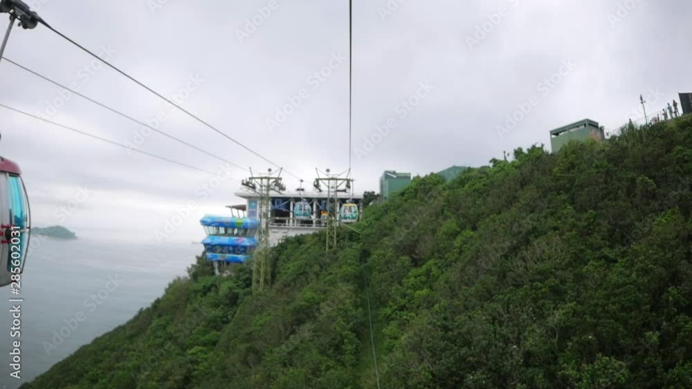 POV riding in a cable car on the side of a mountain. POV riding in a cable car on the side of a mountain.
