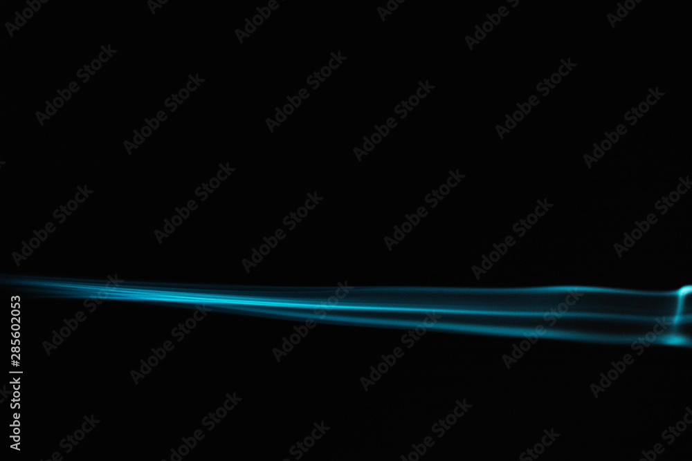 Blue wavy smoke on black background Blue wavy smoke on black background