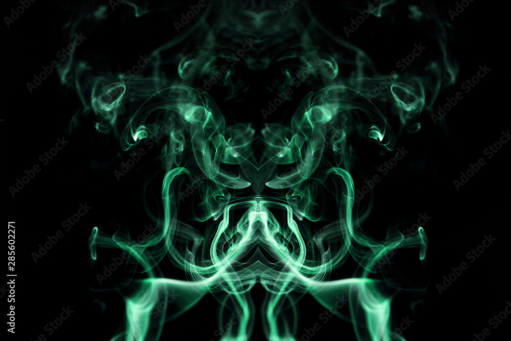 Fototapeta premium Green wavy smoke on black background
