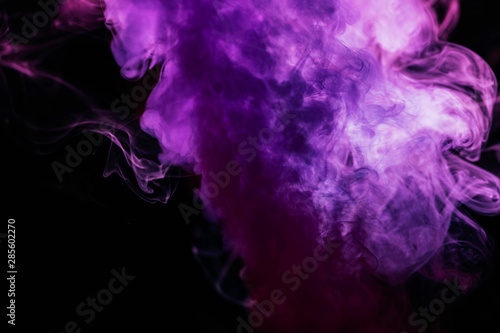 Purple wavy smoke on black background
