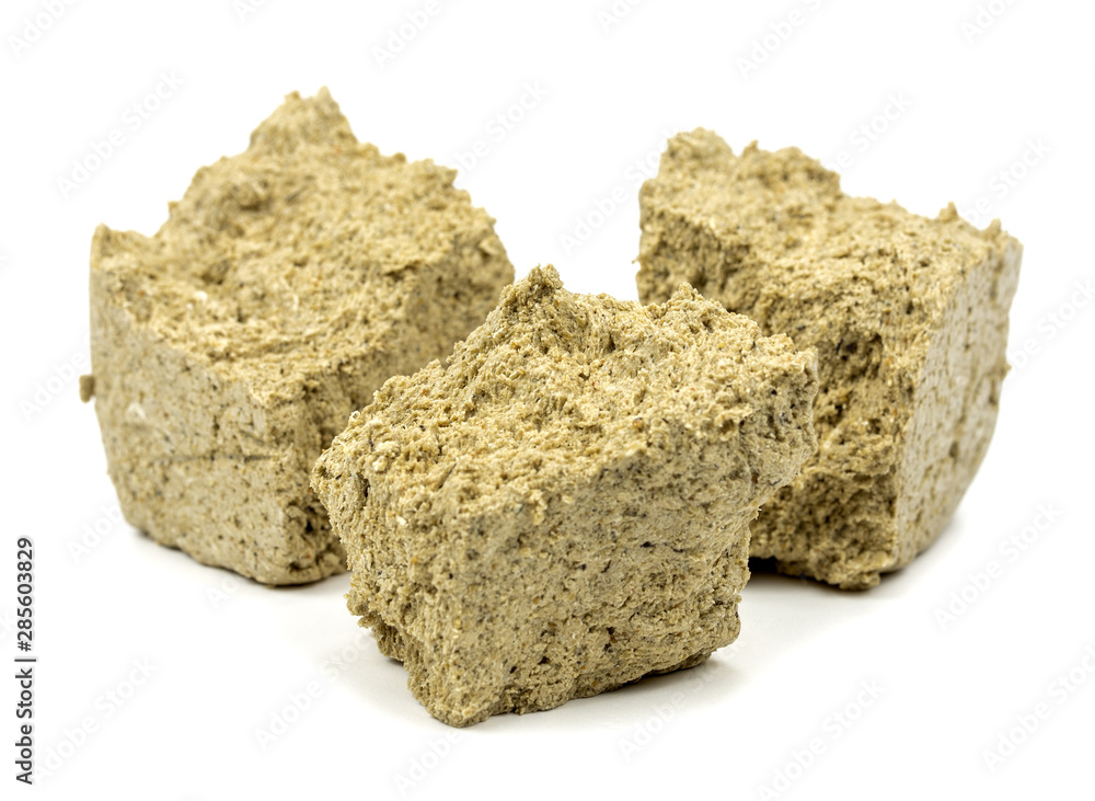 sliced halva on a white background sliced halva on a white background