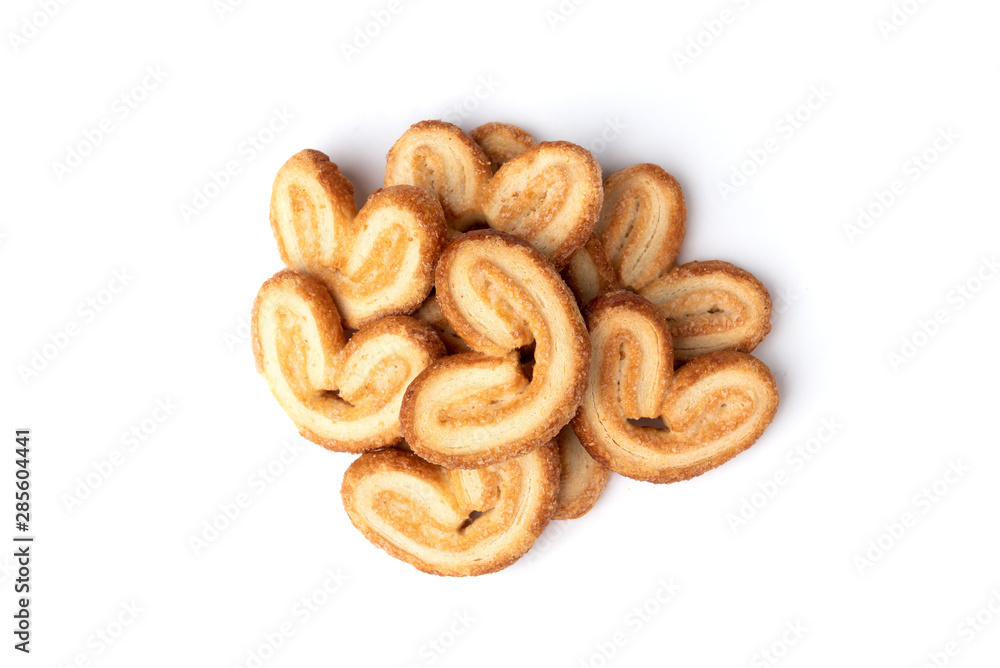 Palmier cookies or puff pastry ears isolated on white background. Palmier cookies or puff pastry ears isolated on white background.