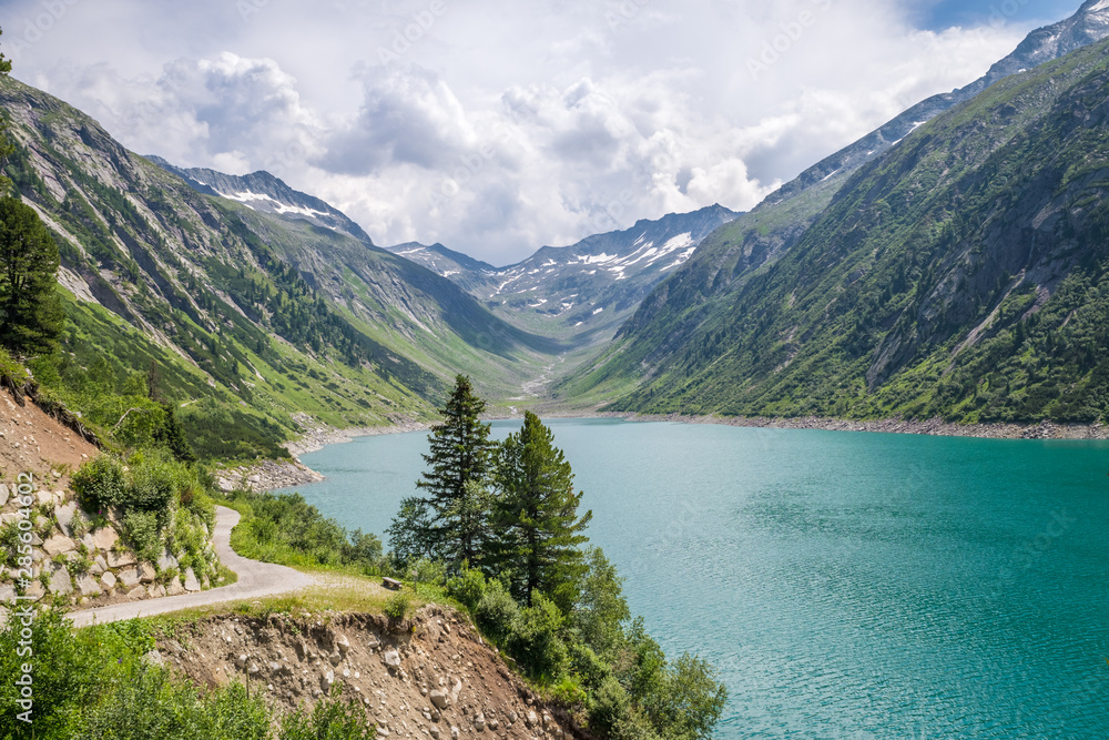 Scenic view of a blue colored glacier lake in the Alps, Europe