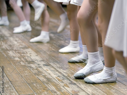 Girls in ballet school. Image of legs, close-up