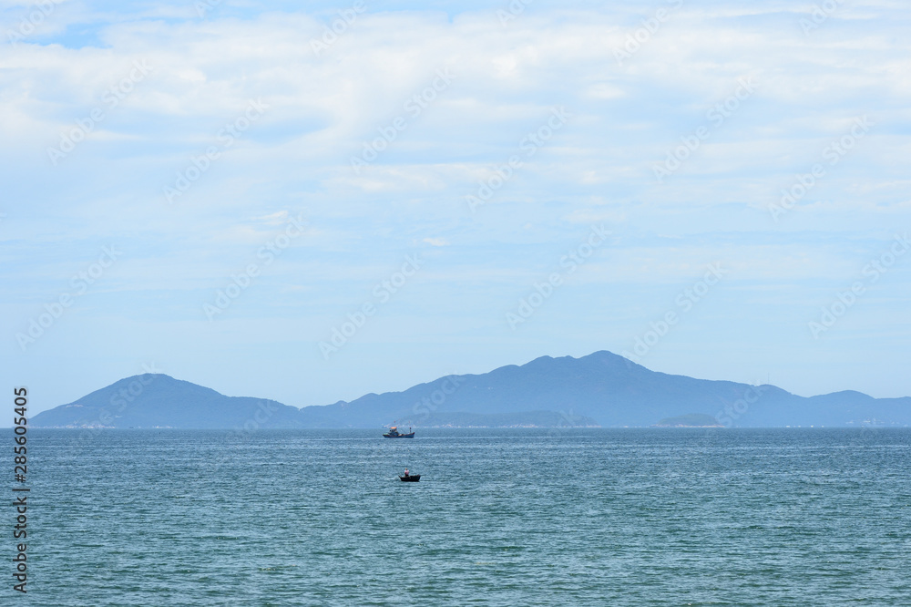 Morning sea landscape with views of the islands and boats. Hoi An, Vietnam