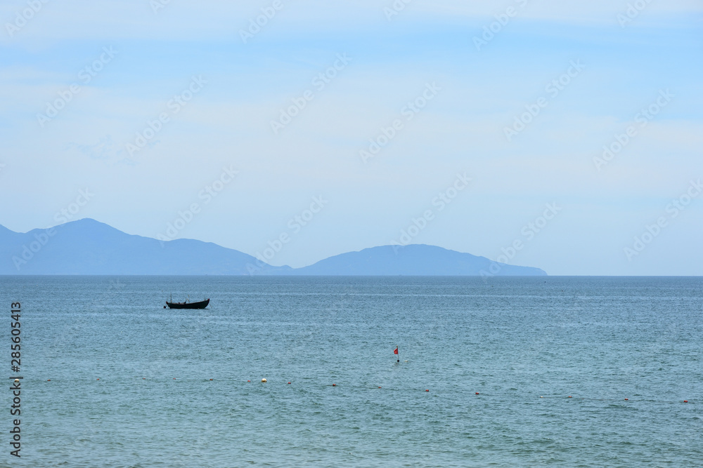 Morning sea landscape with views of the islands and boats. Hoi An, Vietnam