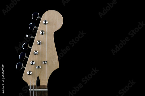 Electric Guitar Peg Head and Tuners on Black Background