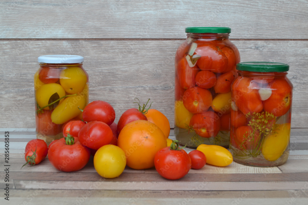 Pickled tomatoes in a jar, red and yellow tomatoes, conservation, ussr, tasty tomatoes, tomatoes for the winter Pickled tomatoes in a jar, red and yellow tomatoes, conservation, ussr, tasty tomatoes, tomatoes for the winter