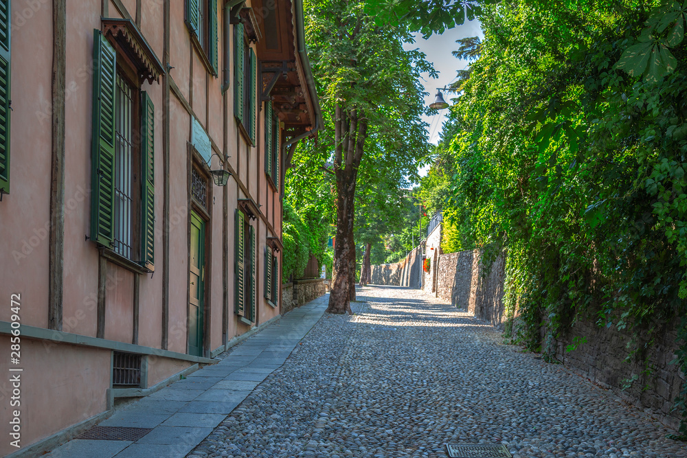 Fototapeta premium View along street Via San Vigilio, Citta Alta, Bergamo, Italy