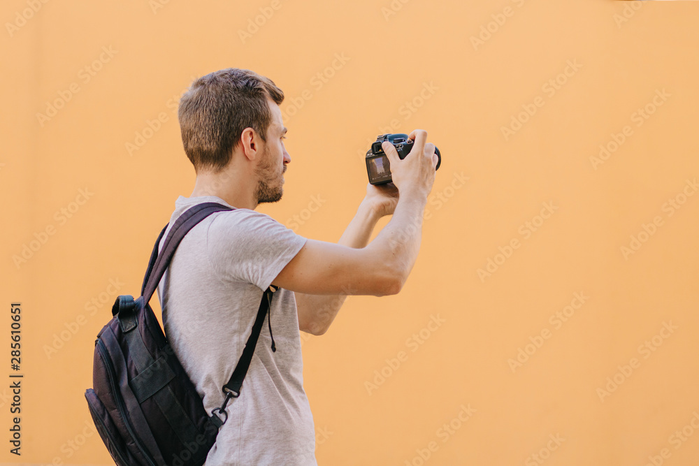 Photographer taking photo on dslr camera isolated Photographer taking photo on dslr camera isolated
