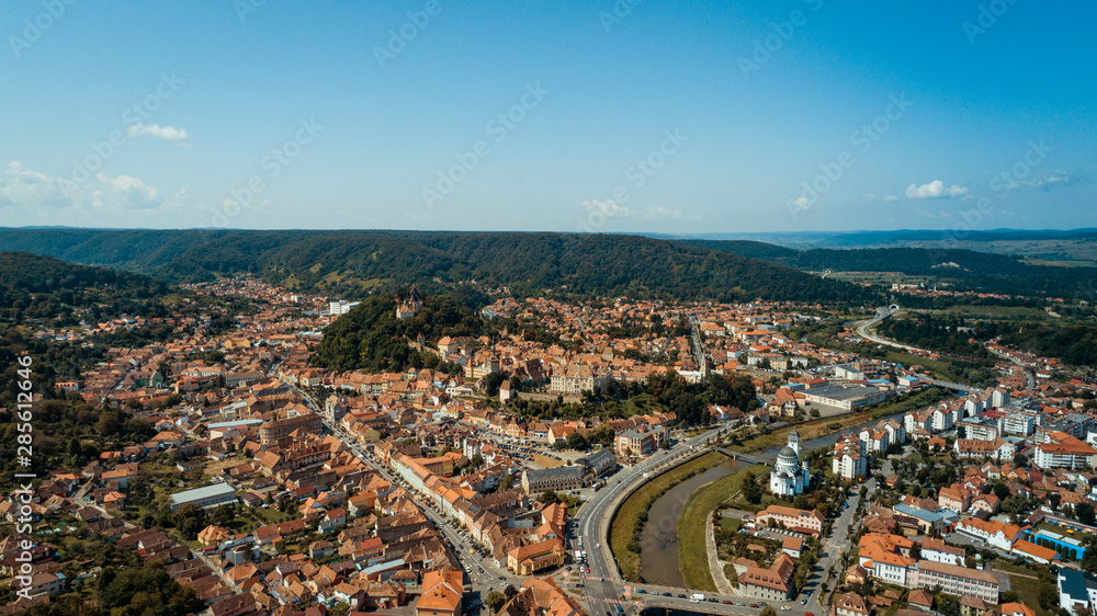 Aerial footage of an old eastern Europe   town on a sunny day