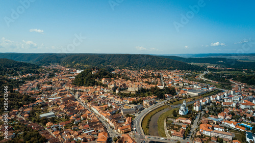 Aerial footage of an old eastern Europe town on a sunny day