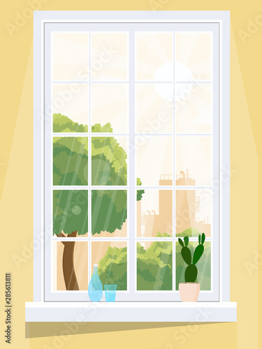 A window overlooking the sun-drenched city.