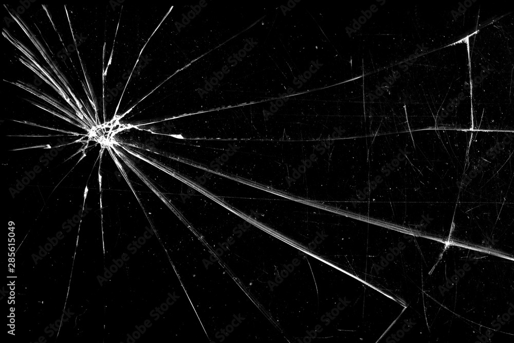 cracked glass isolated on a black background. broken glass Stock 写真 | Adobe  Stock