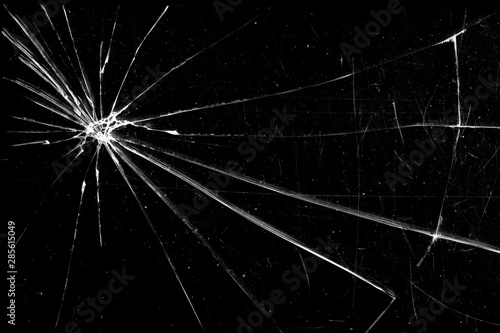 cracked glass isolated on a black background. broken glass
