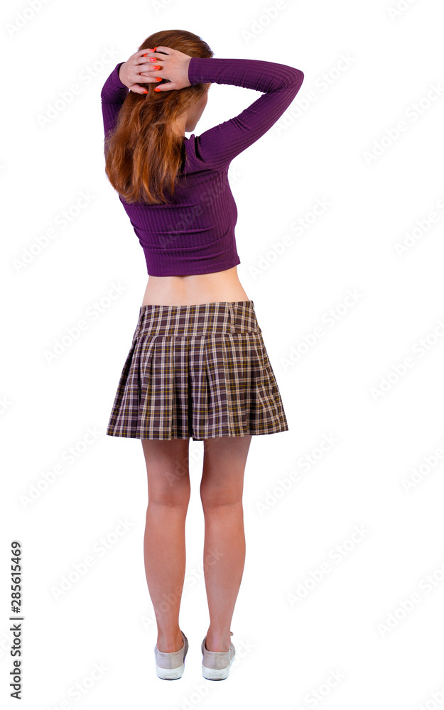 Back view of shocked woman.