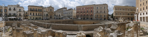 Lecce –  St Oronzo Square. It includes :  the Roman amphitheater ; the St Oronzo Column ; the Sedile palace was the ancient seat of the Town Hall ; St Mark Church ; Bank of Italy palace photo