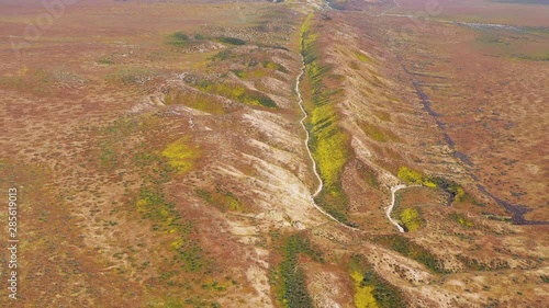 Very good aerial of the San Andreas Fault earthquake faultline running through the Carrizo Plain of California. photo