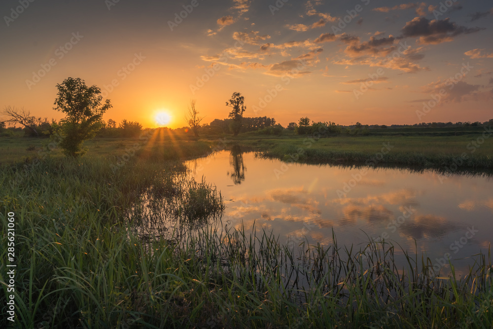 Sunset over the Bzura river near Kamion, Masovia, Poland