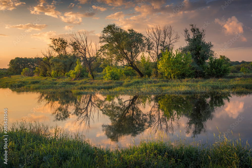 Sunset over the Bzura river near Kamion, Masovia, Poland