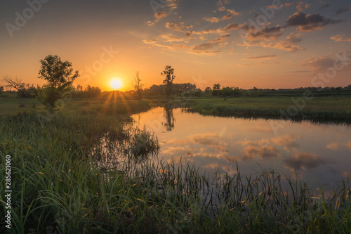 Sunset over the Bzura river near Kamion, Masovia, Poland