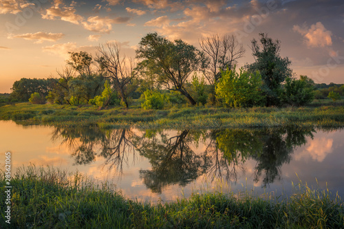 Obraz na płótnie Sunset over the Bzura river near Kamion, Masovia, Poland w salonie