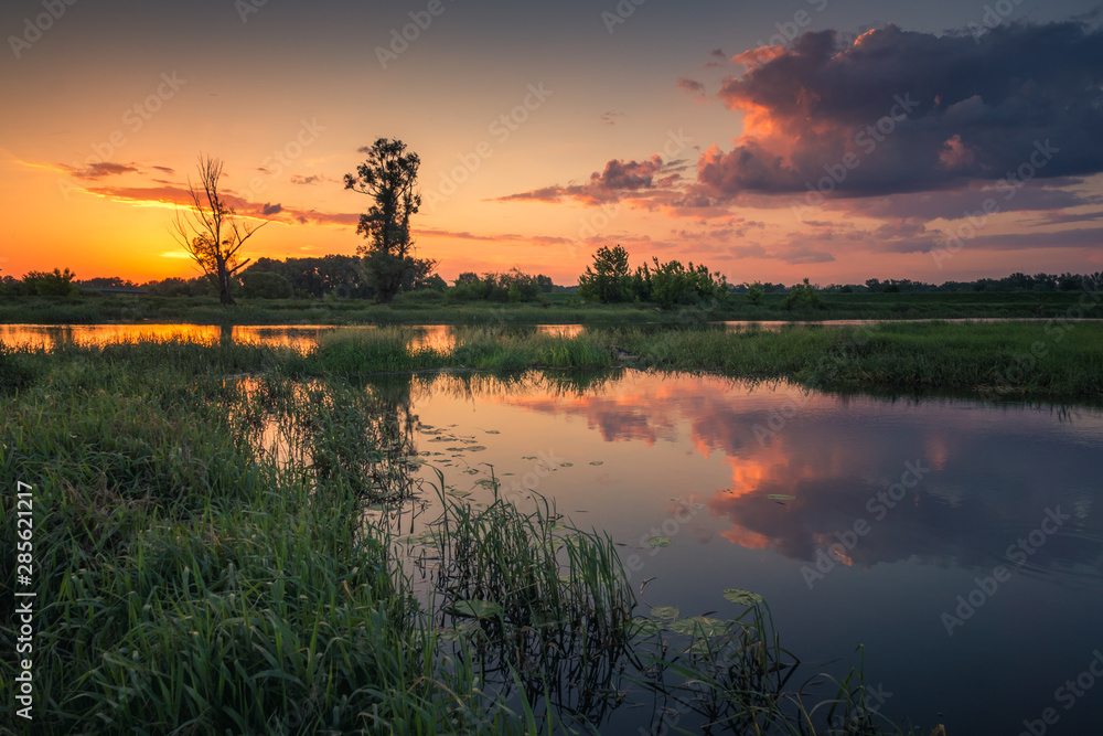 Sunset over the Bzura river near Kamion, Masovia, Poland