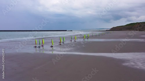 Aerial land carts sail carts blokarts sand yachts are sailed on the beach in France.