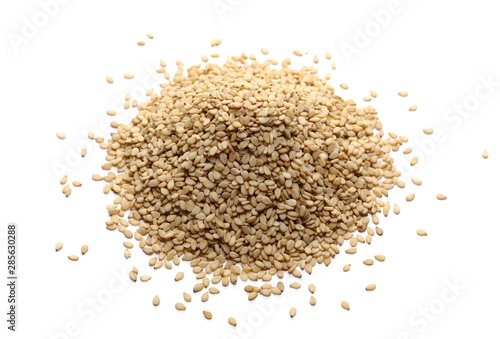 Organic integral sesame seeds isolated on white background