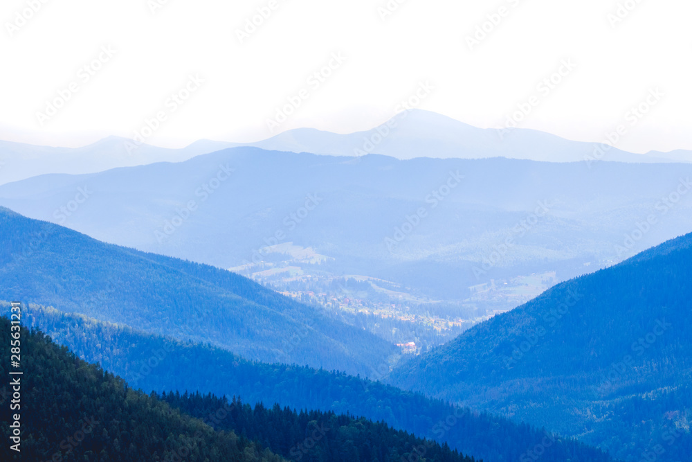 Fototapeta premium Strands of blue mountains that are moving away_