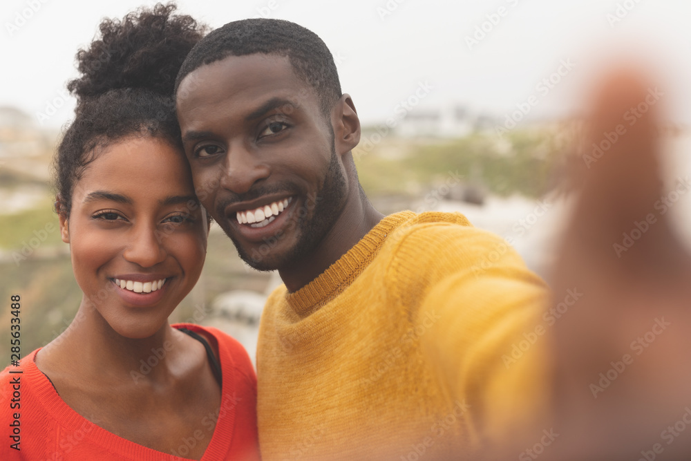 Romantic couple standing near promenade Romantic couple standing near promenade