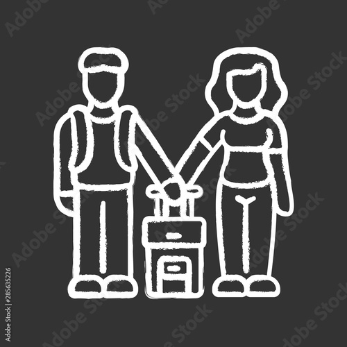 Family class immigrants chalk icon. Couple travel abroad with suitcase. Family trip, vacation, tourism. Honeymoon trip. Tourists, travelers, passengers. Isolated vector chalkboard illustration