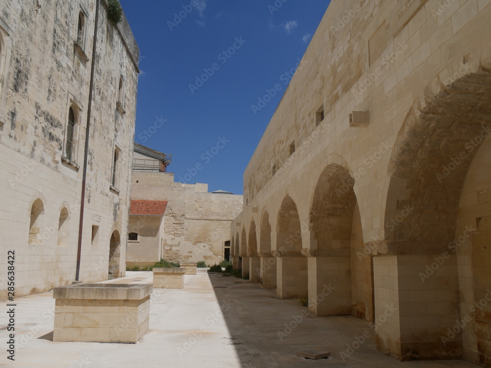 Lecce – Castle. It has a Royal Gate which allows the access and the Rescue Gate on the rear side, which is the most fortified, to counter the dangerous attacks coming from the Adriatic Sea.