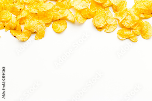 Potato chips pile on white background top view mock up