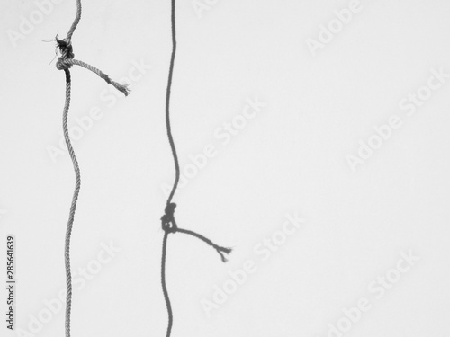 rope with shadow on the wall minimalism style, black and white