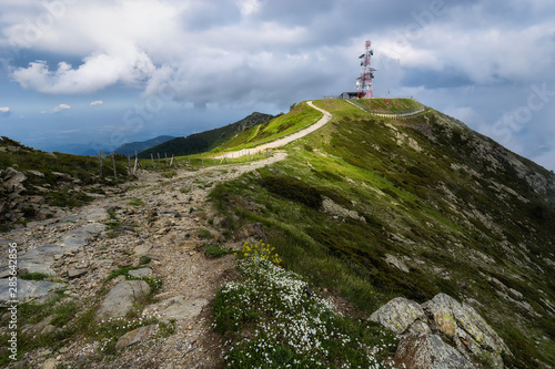 Beautiful path at the top of the mountain towards a weather station