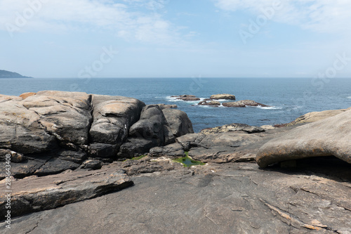 Stones of original shape on a rocky cape near the town of Muxia, some of them have interesting legends. Coast of Death (Costa de Morte), Galicia, Spain - 2019. © Dimitryi