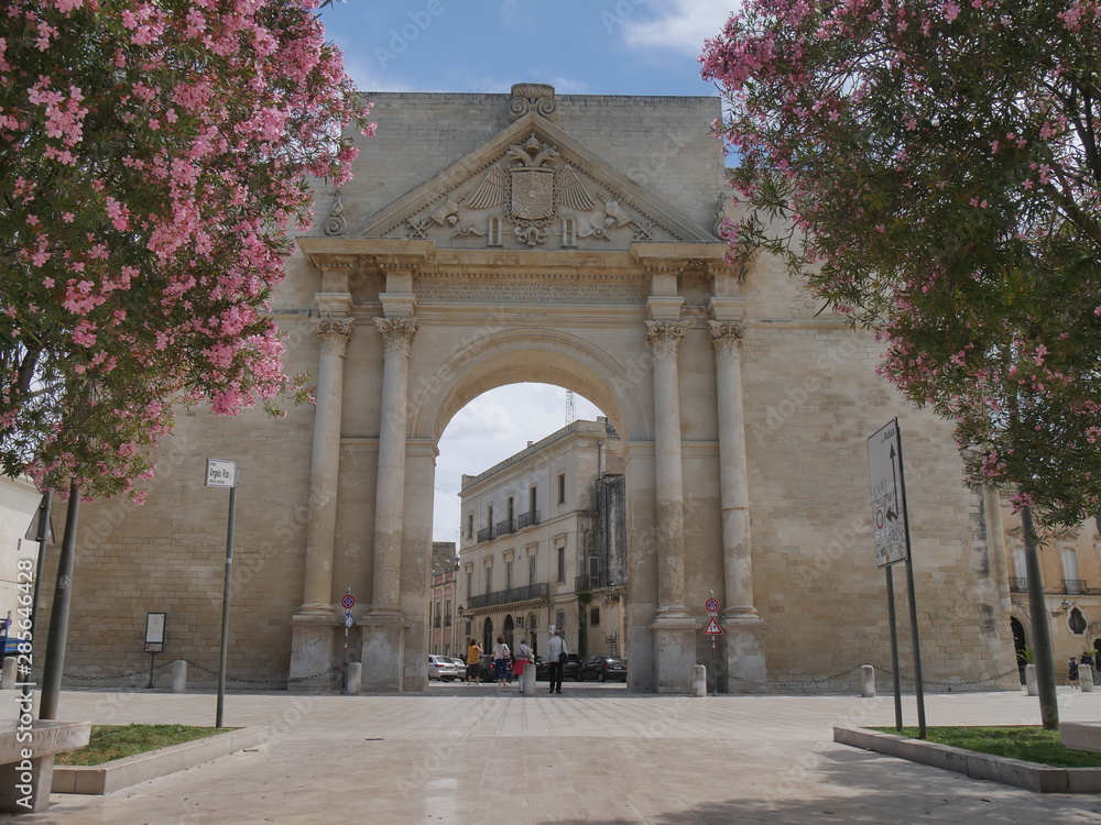 Lecce - Naples Gate. It is one of the ancient entrance in the city near the University. Its facade consists of a single archway flanked by two twin Corinthian columns supporting a triangular pediment.