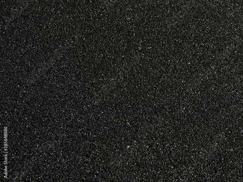 wet asphalt road texture, dark background