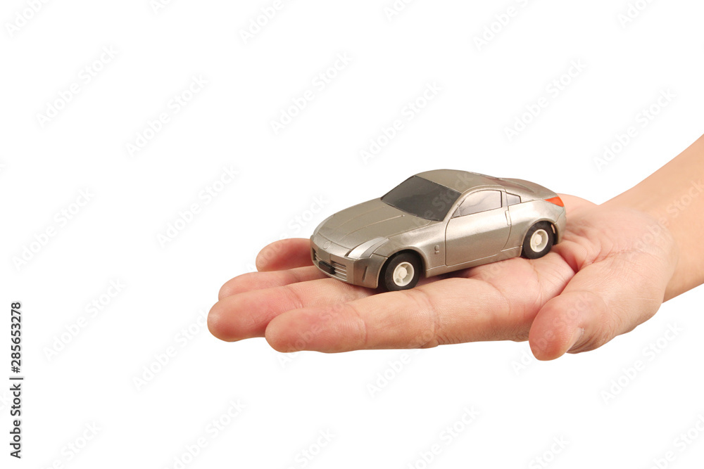 Toy car in hand Protecting security concept Toy car in hand Protecting security concept