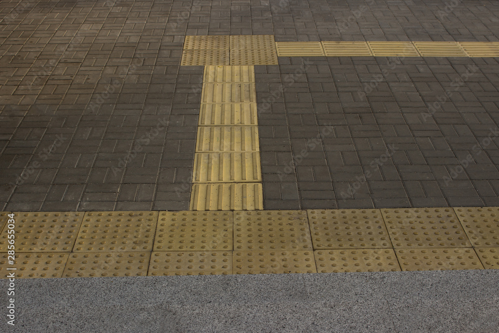 Tactile paving for blind handicap. Closeup view