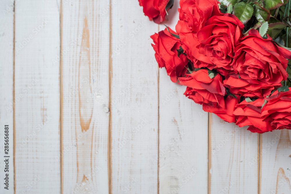 Top view of wedding flowers on white wood background Top view of wedding flowers on white wood background