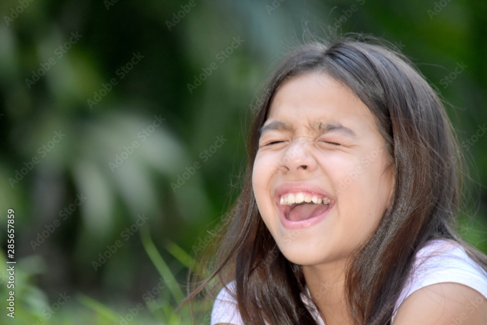 A Laughing Petite Child A Laughing Petite Child
