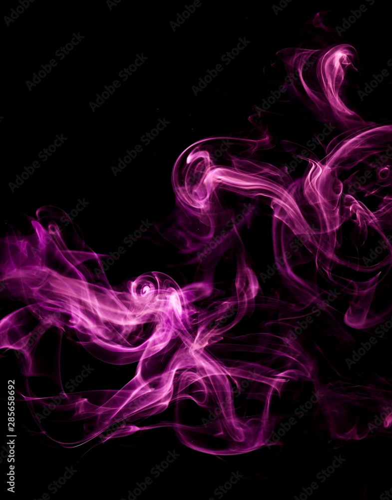 Fototapeta premium Purple smoke on black background