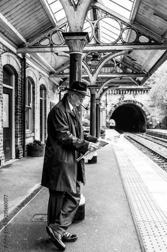 Awaiting his train to York from Knaresborough, the businessman reads his copy of The Yorkshire Post.