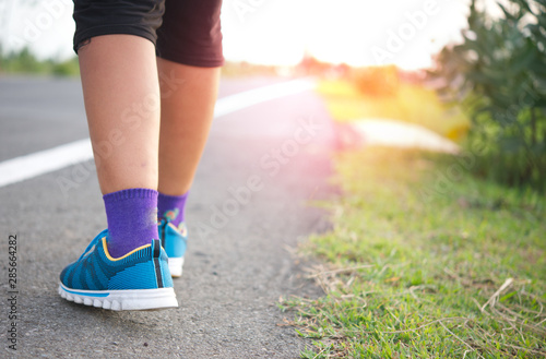 Close up of female jogging shoe in a park.