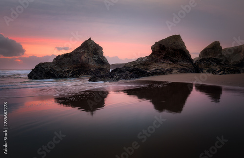 Twilight Silhouettes of Sea Stacks with Reflections, Bedruthan Steps, North Cornwall
