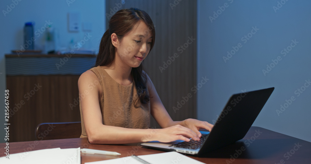 Woman work on laptop computer at home Woman work on laptop computer at home