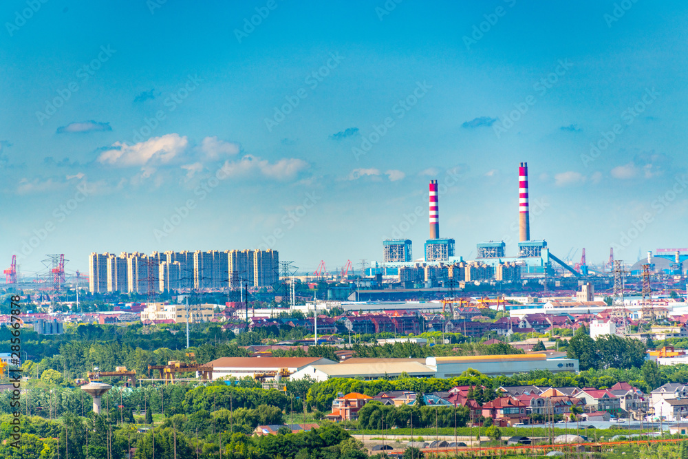 Industrial factories and nearby homes in Shanghai, China